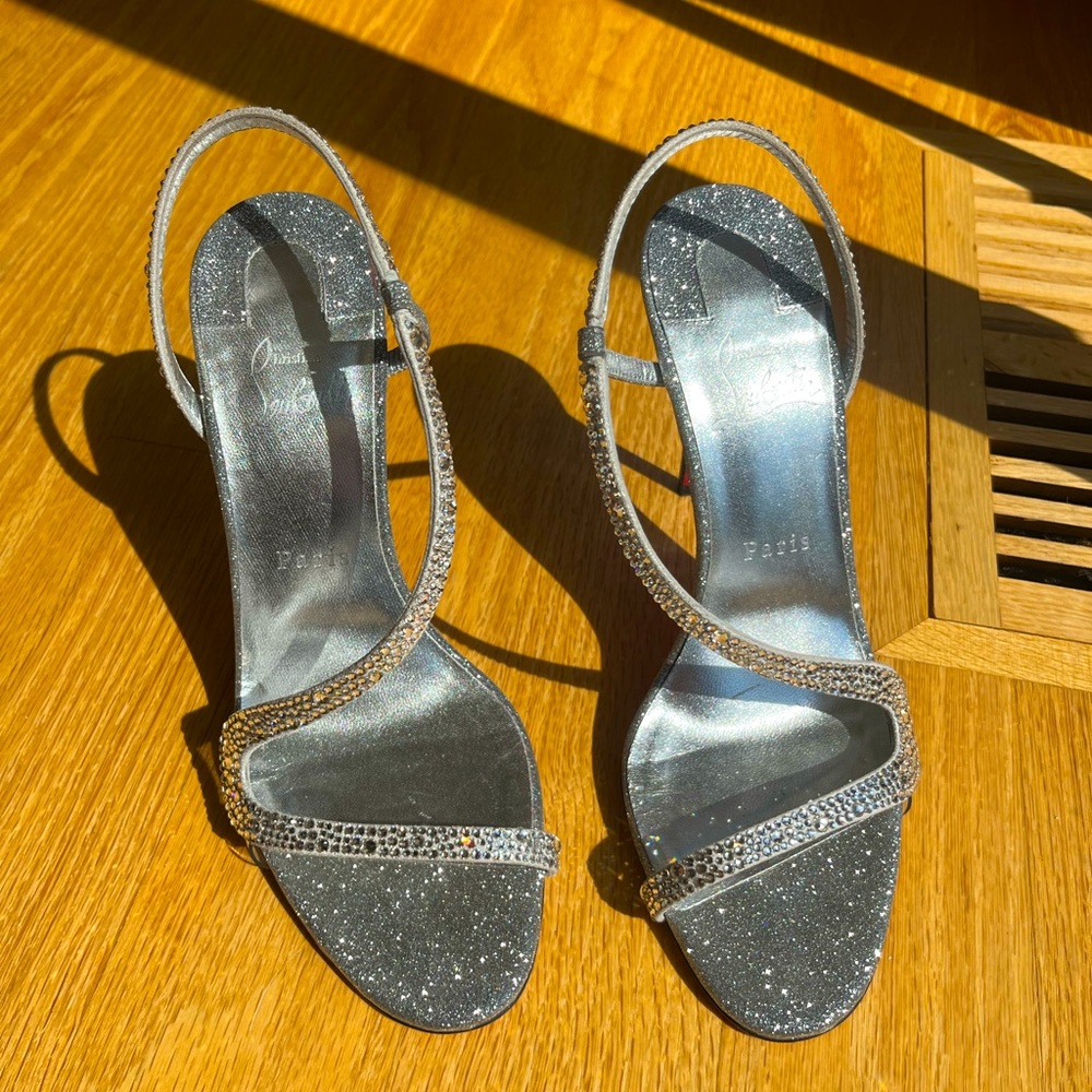 100% Authentic Christian Louboutin Silver Sparkle stilettos. Size 39.! HOLIDAYS!